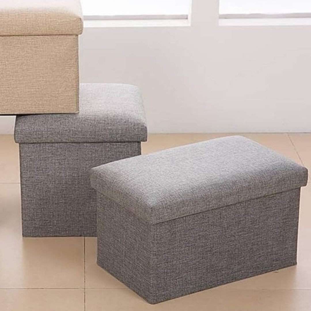 Banco baúl puff plegable gris 40x25x25cm.