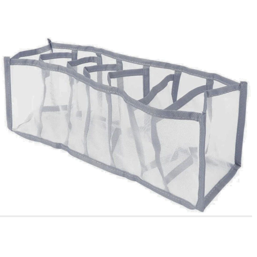 Organizador de malla de red con separaciones 35x14x12cm.