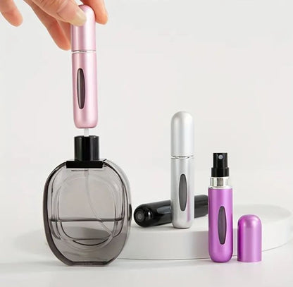 Mini atomizador para perfume recargable 5ml. Fucsia