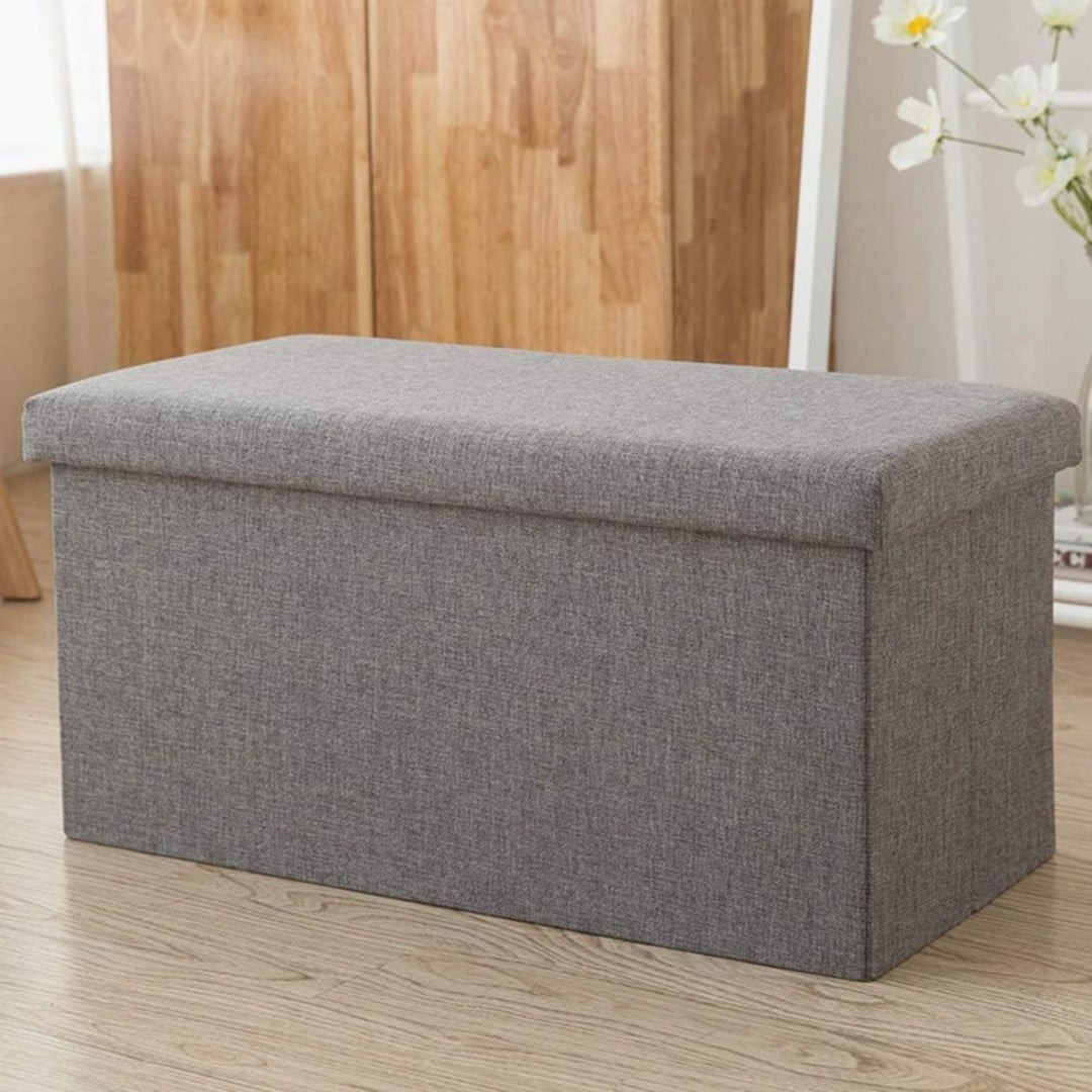 Banco puff baúl plegable gris 76x38x36cm.