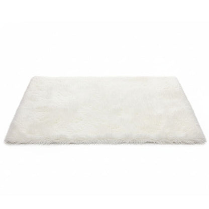 Alfombra blanca de felpa 50x80cm.