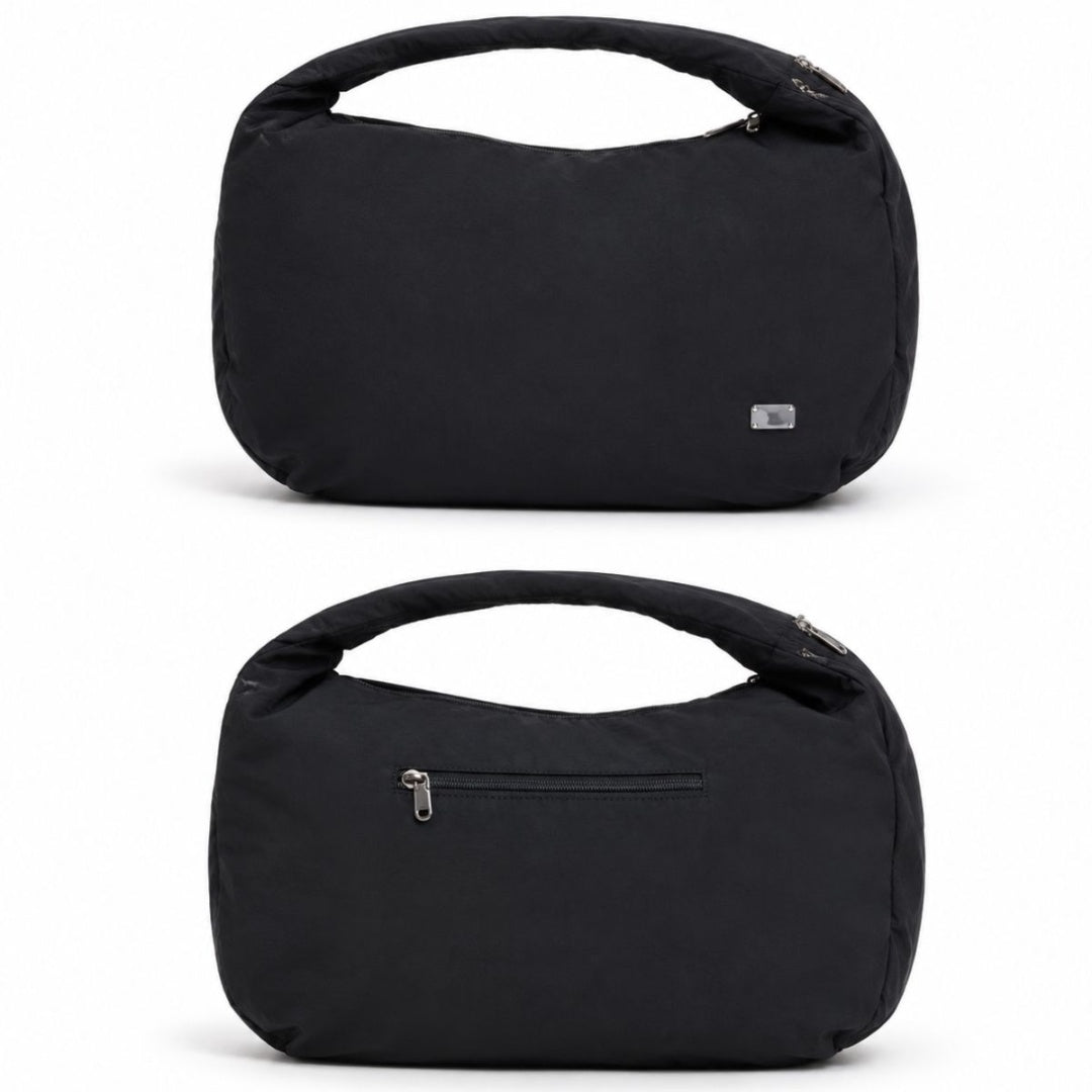 Bolso negro extensible 52x37cm.